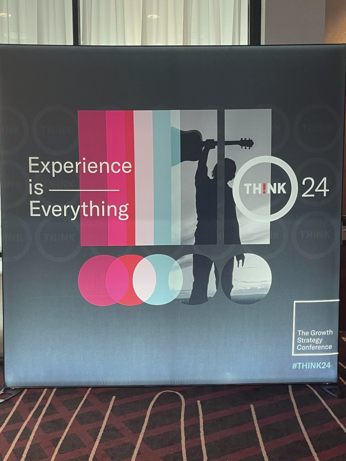 Experience is Everything on a THINK 24 banner, with the exclamation picture window and circle overlays.
